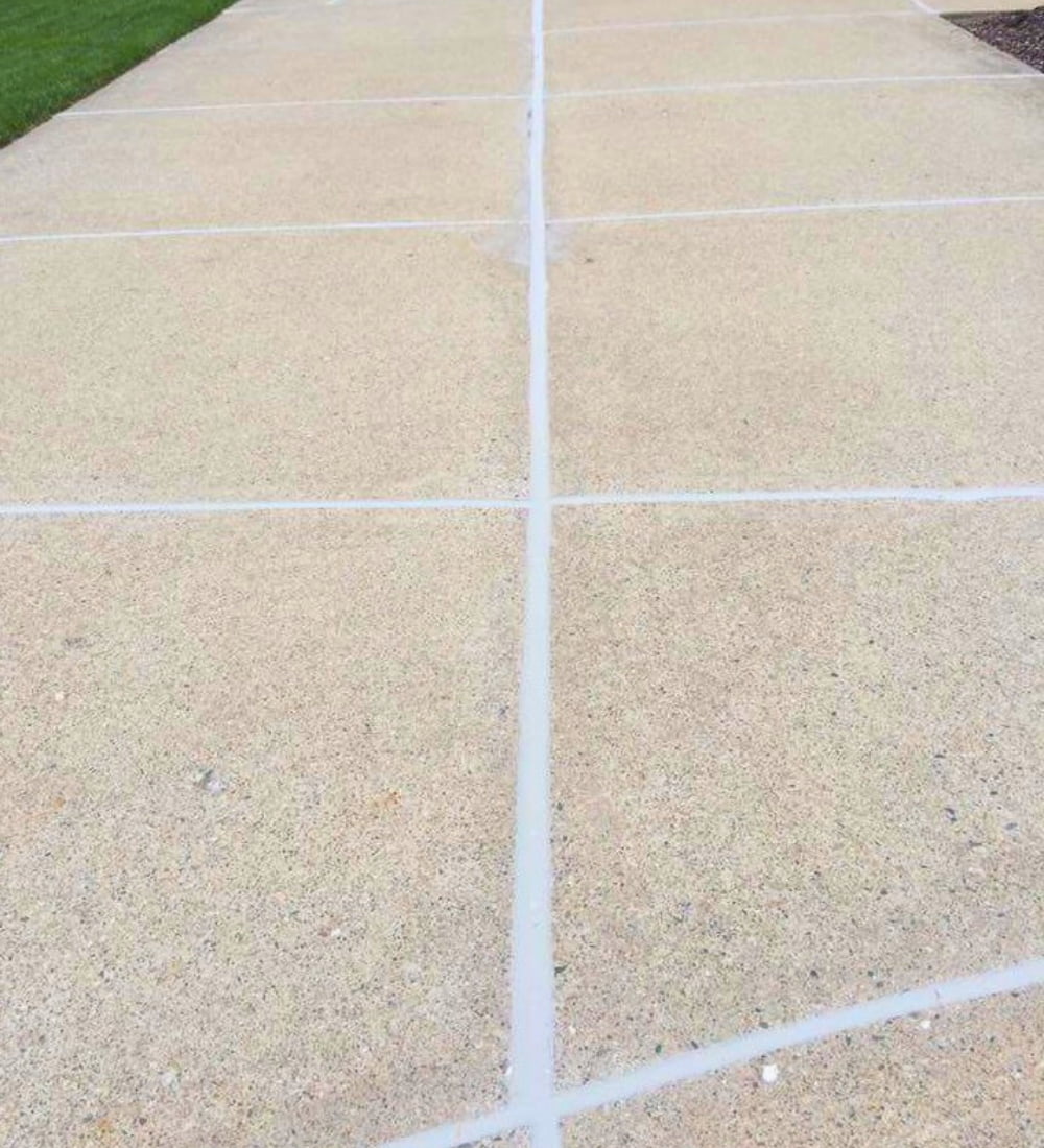 Caulking expansion joints in Omaha to protect concrete surfaces from moisture and cracking.