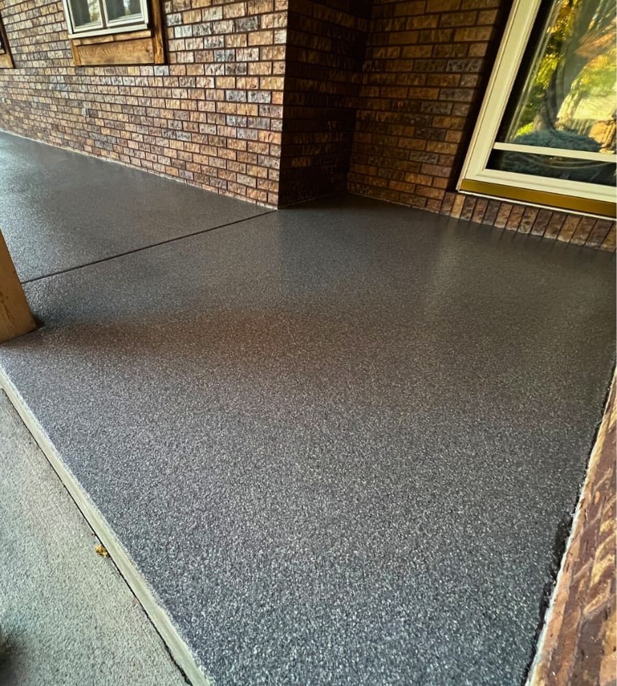 Epoxy floor installed in a finished basement of a home in the Omaha metro